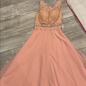 A pink lace bridesmaid dress